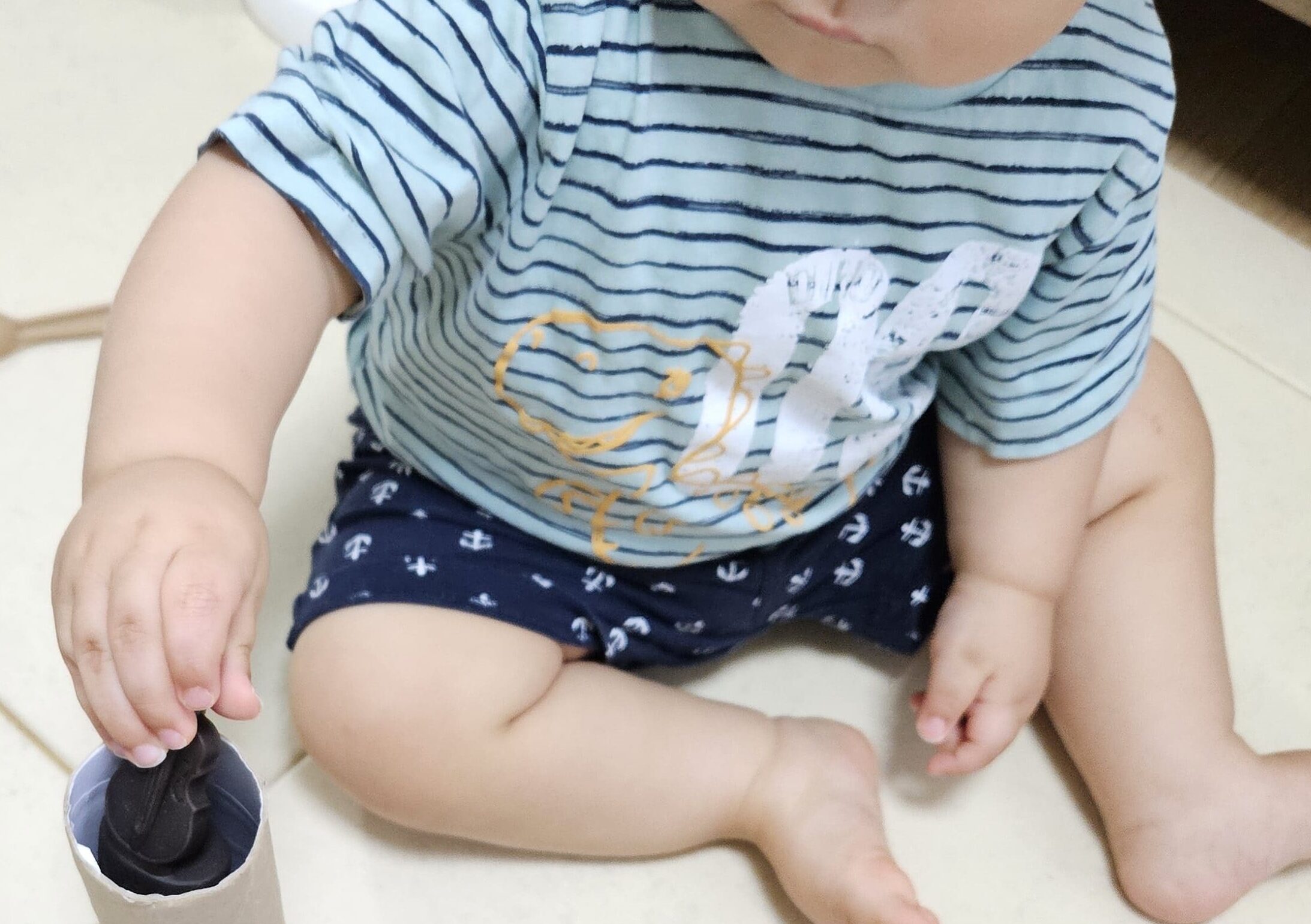 Toddler Playing with Pom-poms, pom-pom activities for toddlers